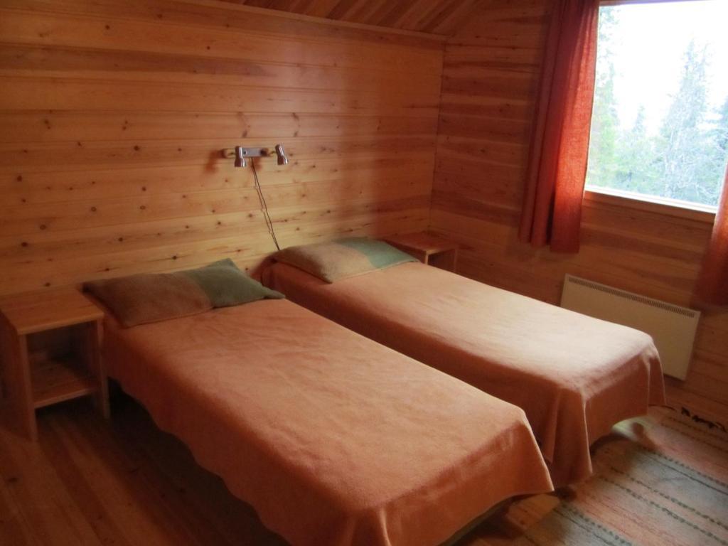 Rukajarven Kelopirtit Cottages Zimmer foto